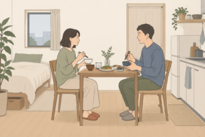 小さな部屋で二人だけの食事をするイメージ